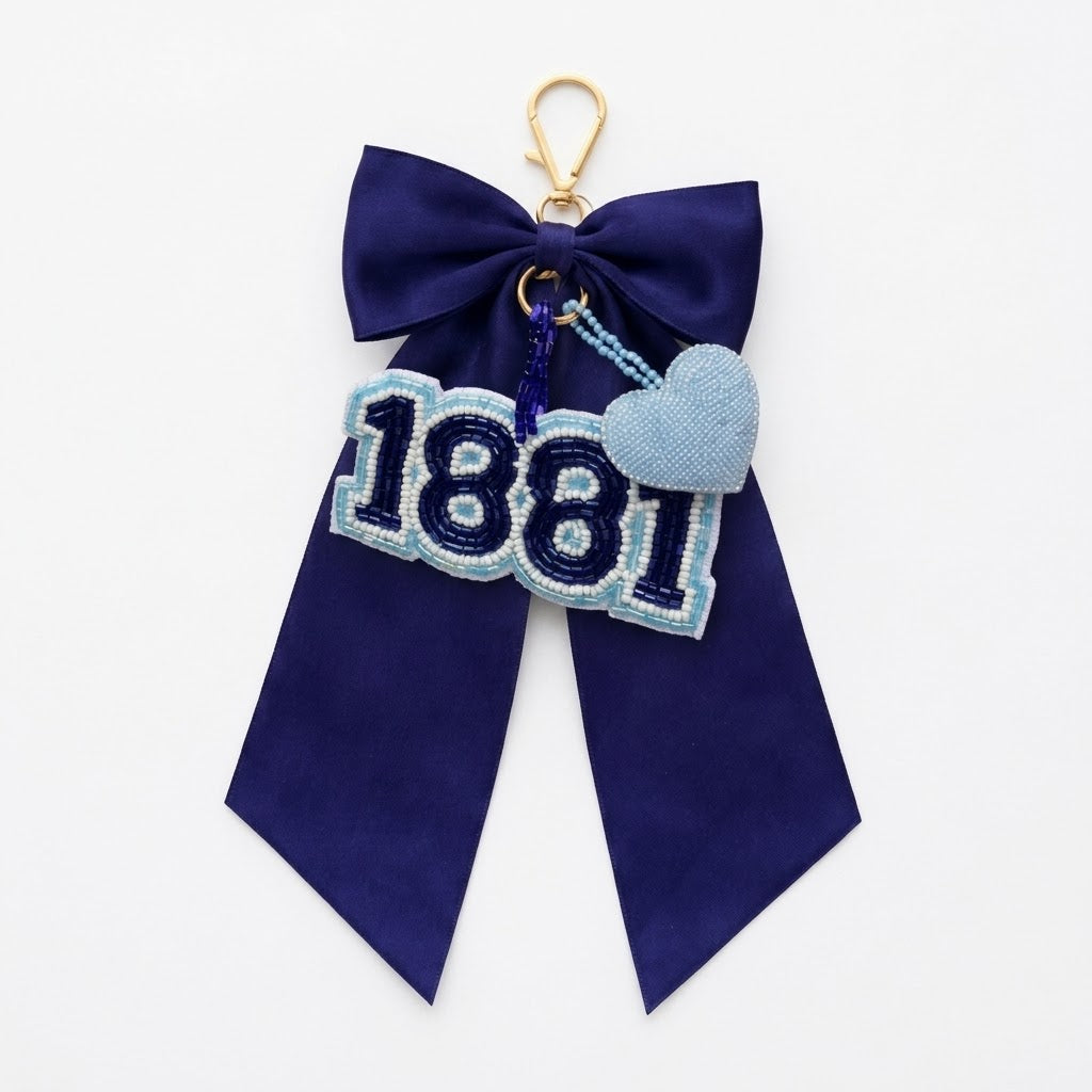 The Ultimate 1881 Heritage Duo: Bag Charm & Crystal Headband Set